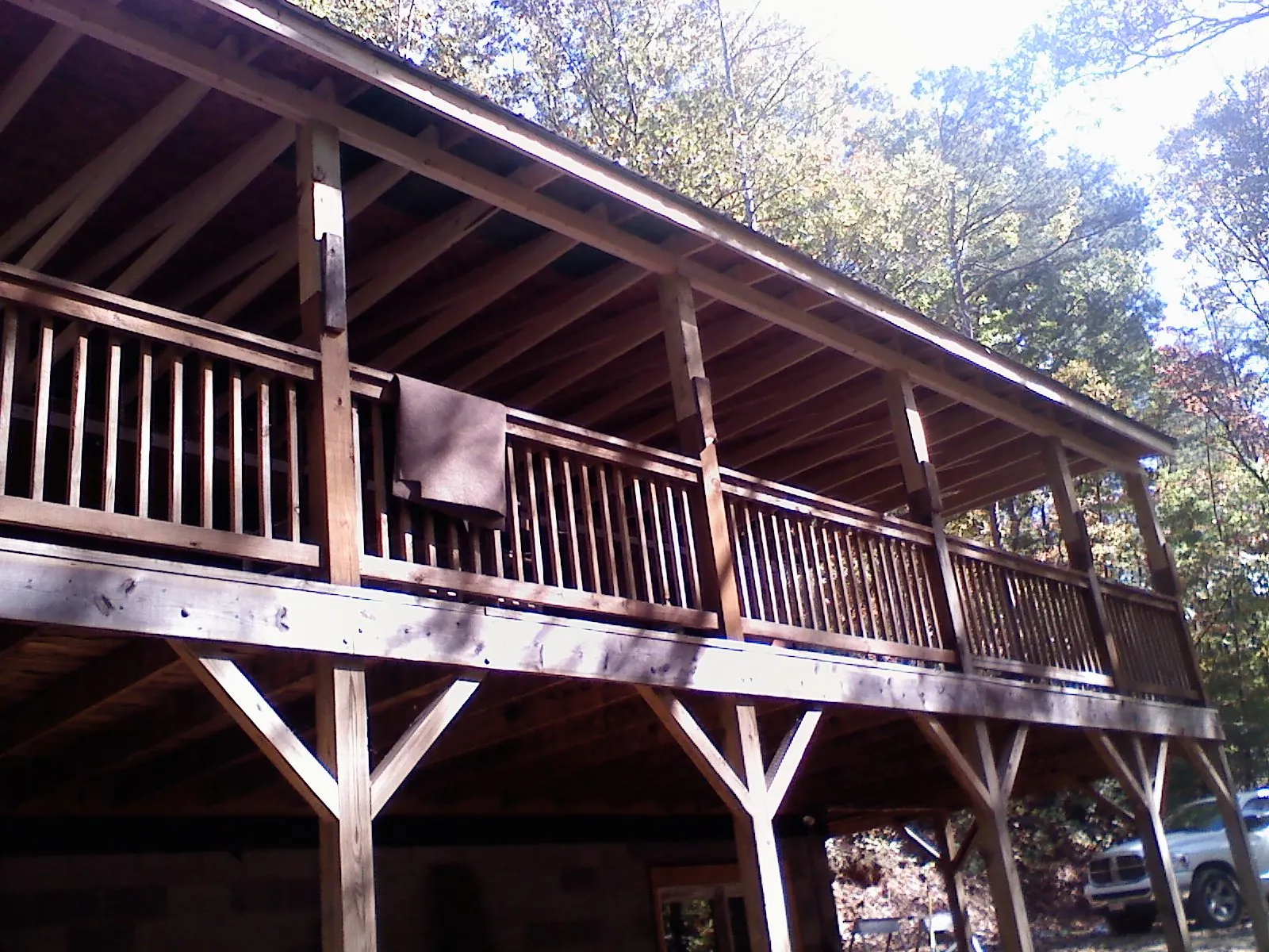 Timber framing under a new elevated porch and deck — Roof Leak Repair in Mirror Lake by Roofing Brothers